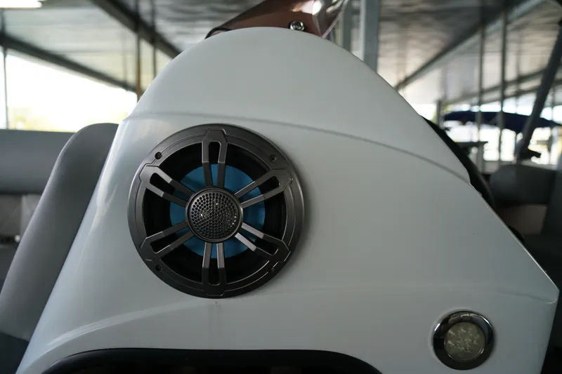 Slide: The Image of Close-up of a 2024 Lexington Palm Breeze Emerg boat speaker system. - 17