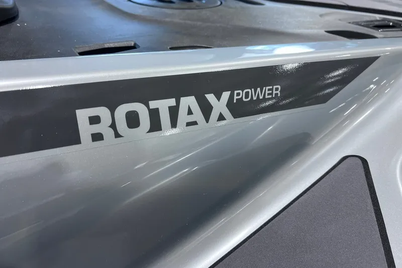 Slide: The Image of Close-up of 2026 Sea-Doo RXP-X 325 featuring "Rotax Power" branding. - 22