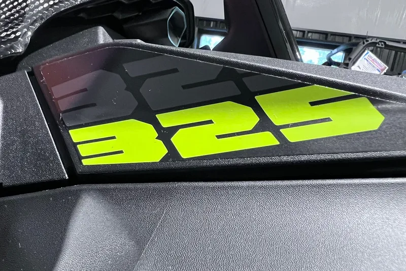 Slide: The Image of Close-up of 2026 Sea-Doo RXP-X 325 with bold "325" decal. - 23