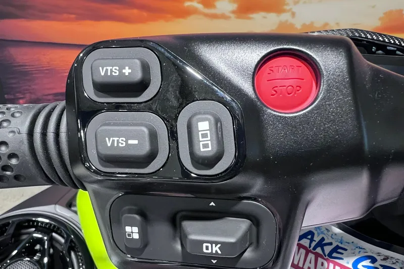 Slide: The Image of Close-up of 2026 Sea-Doo RXP-X 325 handlebar controls with start/stop button. - 16