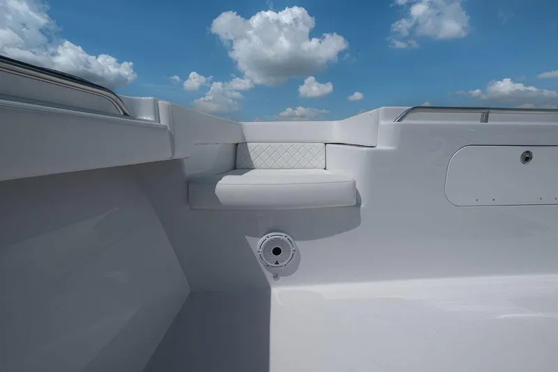 Slide: The Image of 2026 Toro Yachts Toro 42 interior with white seating and clear blue sky. - 37