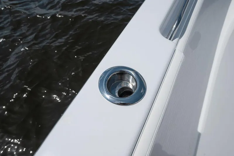 Slide: The Image of Close-up of a 2026 Toro Yachts Toro 42 boat detail with water in the background. - 31
