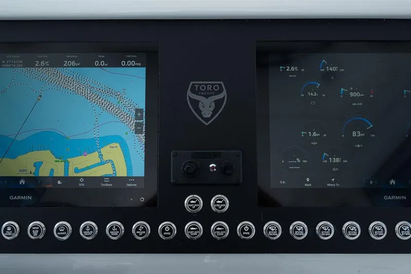 Slide: The Image of Instrument panel of 2026 Toro Yachts Toro 42 with Garmin navigation displays. - 50