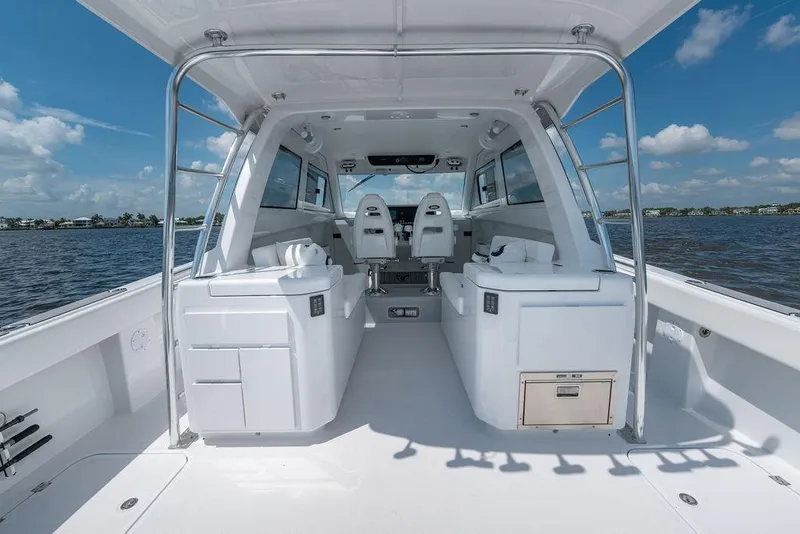 Slide: The Image of Luxurious 2026 Toro Yachts Toro 42 interior with sleek design and spacious seating on open water. - 13
