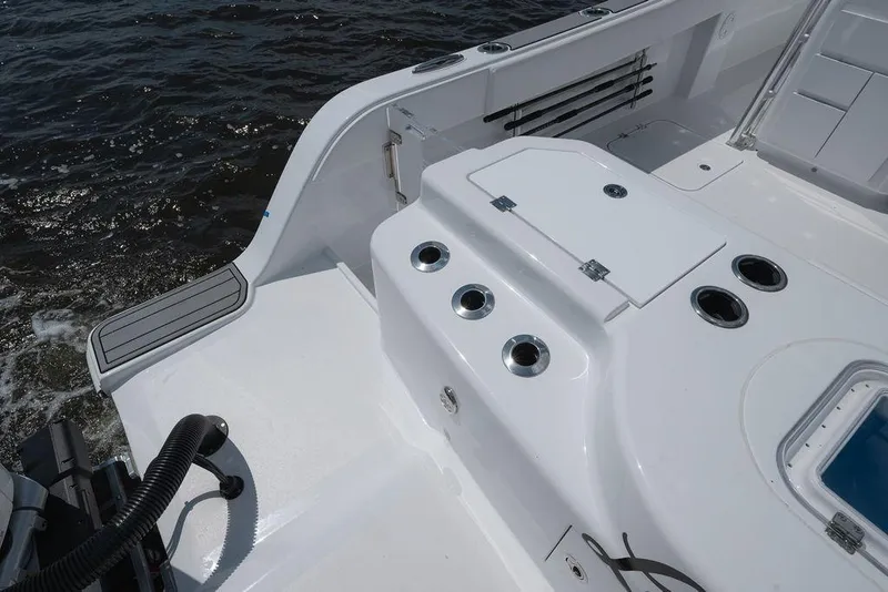 Slide: The Image of Sleek deck of 2026 Toro Yachts Toro 42, featuring modern fixtures and ocean backdrop. - 27