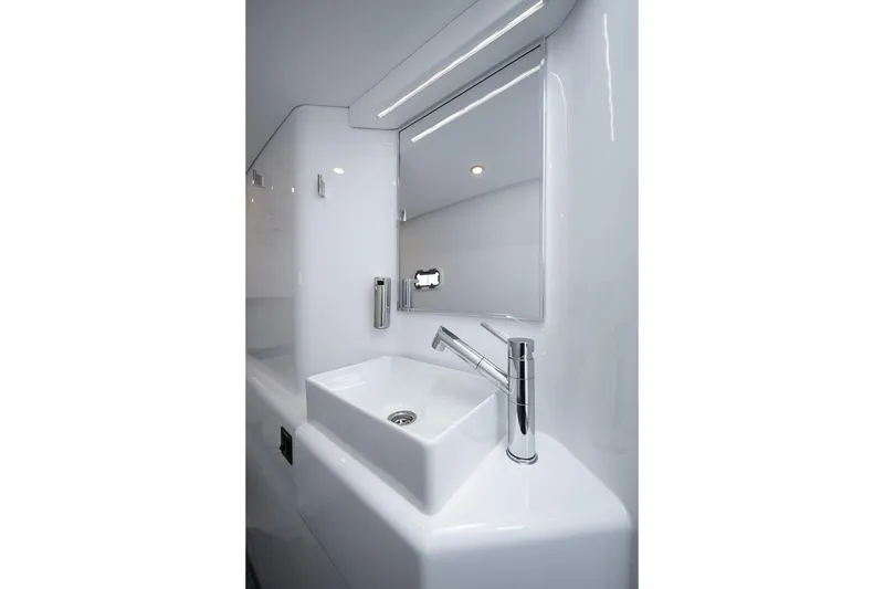 Slide: The Image of Modern bathroom sink and mirror on 2026 Toro Yachts Toro 42. - 53