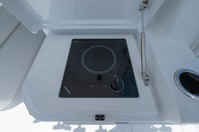 Slide: The Image of Built-in stovetop on 2026 Toro Yachts Toro 42, featuring sleek design and modern controls. - 46