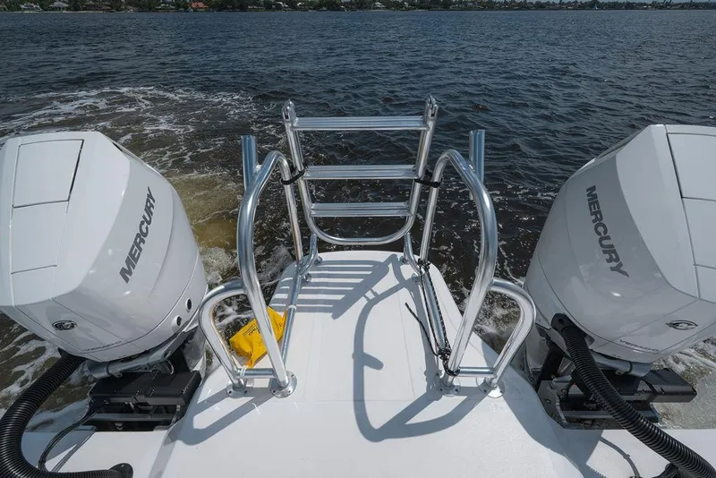 Slide: The Image of Toro Yachts Toro 42 (2026) with dual Mercury outboard engines on open water. - 14