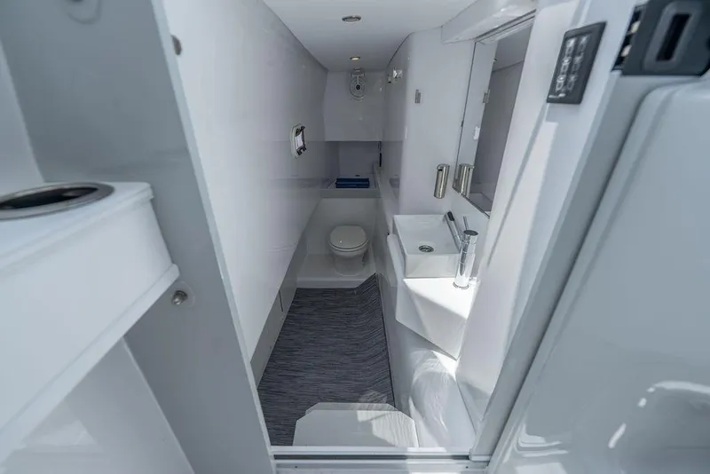 Slide: The Image of Modern bathroom interior of 2026 Toro Yachts Toro 42, featuring sleek design and compact amenities. - 52