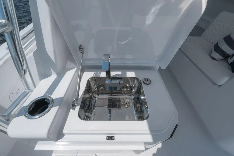 Slide: The Image of Luxury sink area on 2026 Toro Yachts Toro 42, featuring sleek design and modern fixtures. - 45