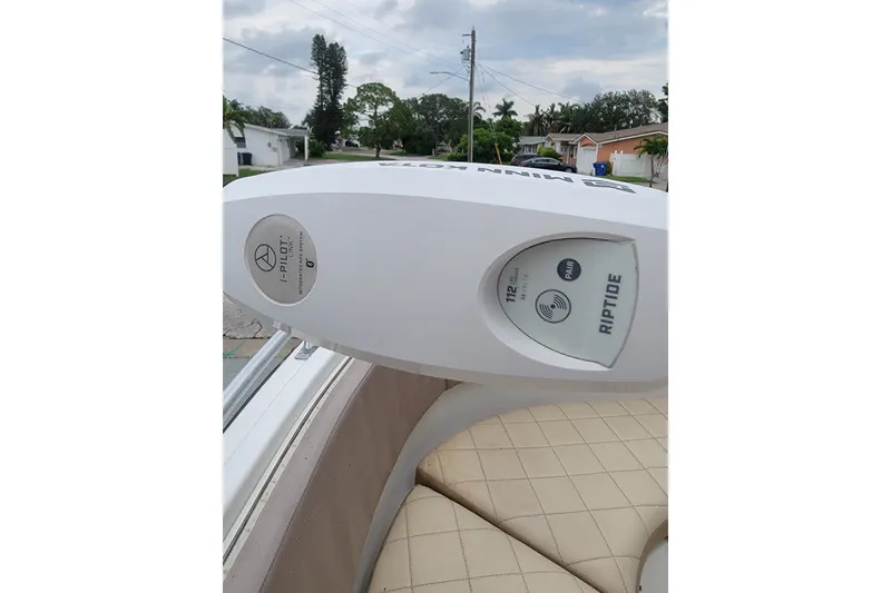 Slide: The Image of Minn Kota Riptide trolling motor on 1999 Mako 252 Center Console boat. - 17