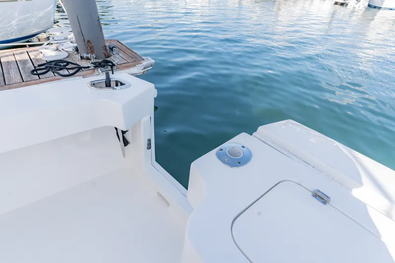 Slide: The Image of 2023 Albemarle 41 Custom Carolina Edition boat docked by the water. - 27