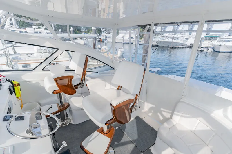 Slide: The Image of Interior of 2023 Albemarle 41 Custom Carolina Edition yacht with luxurious seating and helm. - 13