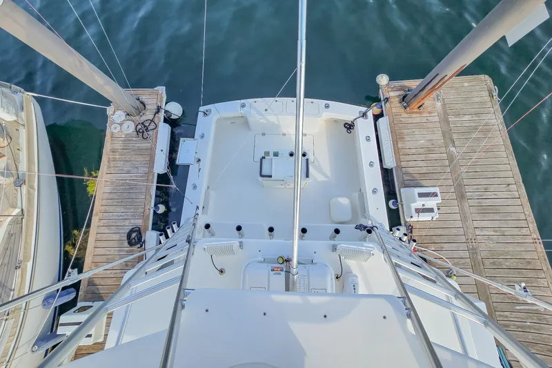 Slide: The Image of Overhead view of 2023 Albemarle 41 Custom Carolina Edition docked at marina. - 29