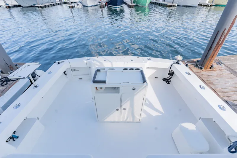 Slide: The Image of 2023 Albemarle 41 Custom Carolina Edition boat docked, featuring spacious deck and fishing amenities. - 17