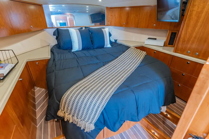 Slide: The Image of Luxurious cabin interior of 2023 Albemarle 41 Custom Carolina Edition yacht. - 24