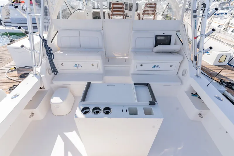 Slide: The Image of 2023 Albemarle 41 Custom Carolina Edition boat interior with seating and fishing equipment. - 15