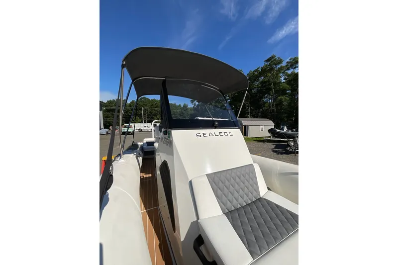 Slide: The Image of 2024 Sealegs 7.5M boat with canopy, featuring sleek design and comfortable seating. - 19