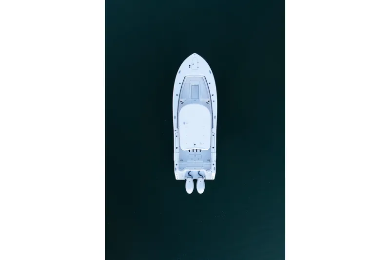 Slide: The Image of Aerial view of 2027 Sea Hunt Ultra 265SE boat on dark water. - 47