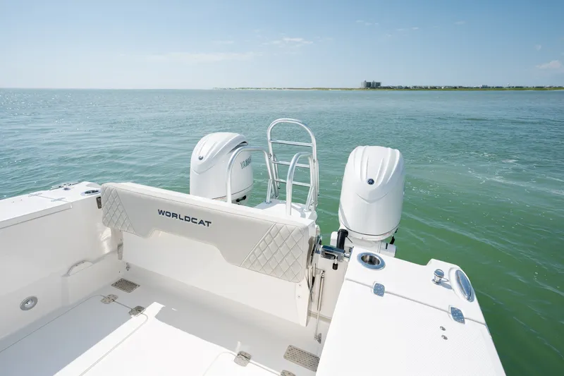 Slide: The Image of 2026 World Cat 265 CC-X boat with twin Yamaha engines on open water. - 37