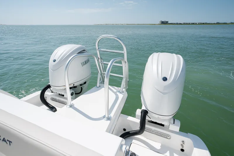 Slide: The Image of 2026 World Cat 265 CC-X boat with dual Yamaha outboard motors on open water. - 41