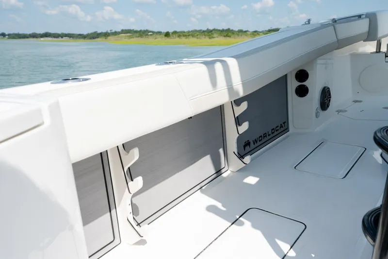 Slide: The Image of 2026 World Cat 265 CC-X boat interior with sleek design and storage compartments. - 35