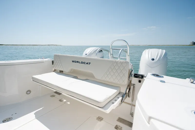 Slide: The Image of 2026 World Cat 265 CC-X boat with seating, ocean view, and dual engines. - 39