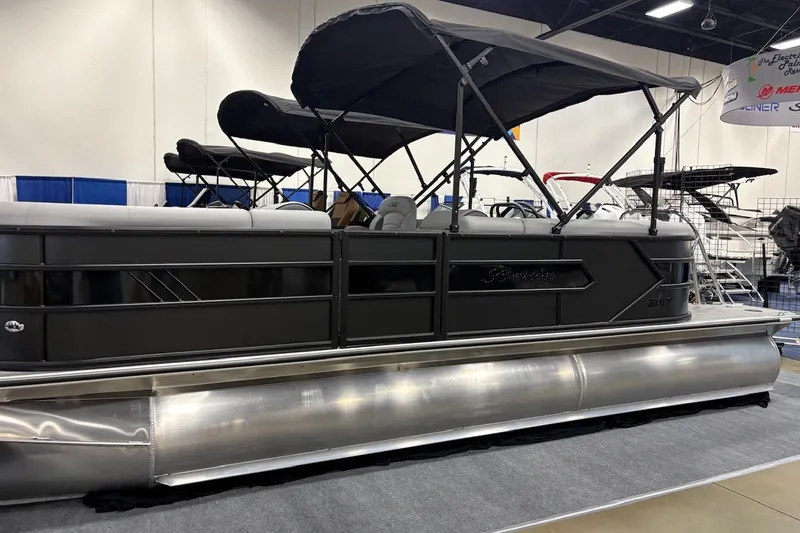 The Image of 2026 Bentley Pontoons Bolt 223 pontoon boat displayed indoors with canopy. - 0