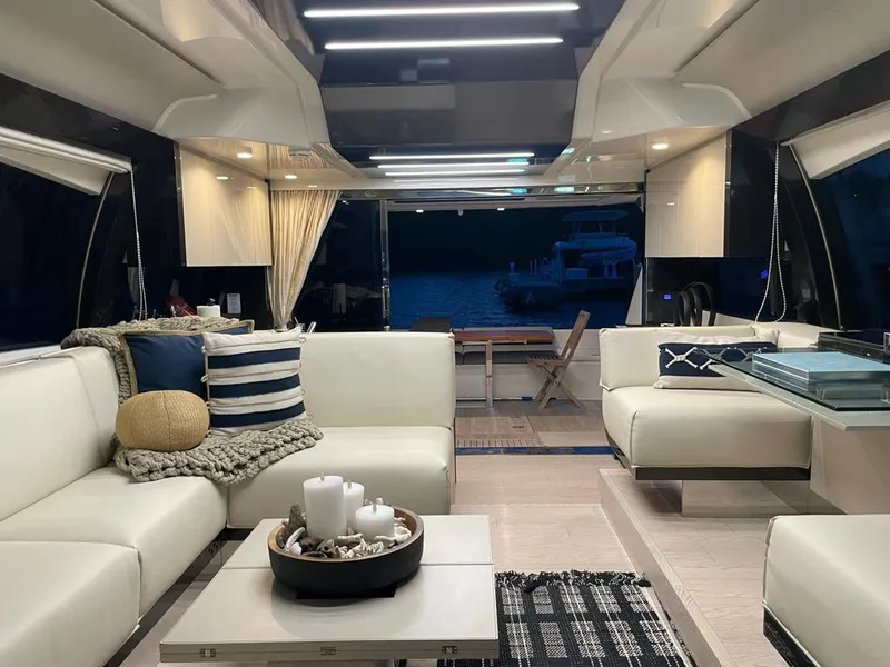 Slide: The Image of Luxurious interior of 2016 Ferretti Yachts 550 with modern decor and waterfront view. - 15