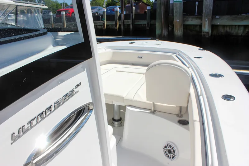Slide: The Image of 2027 Sea Hunt Ultra 265SE boat interior with seating and sleek design. - 33