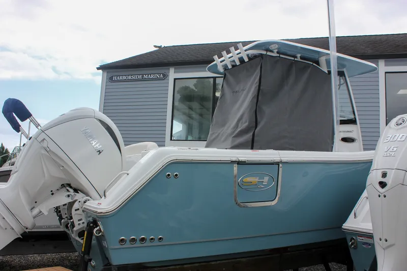 Slide: The Image of 2027 Sea Hunt Ultra 265SE boat with Yamaha engines at Harborside Marina. - 49