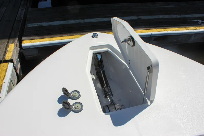 Slide: The Image of Bow storage compartment of 2027 Sea Hunt Ultra 265SE boat at dock. - 41