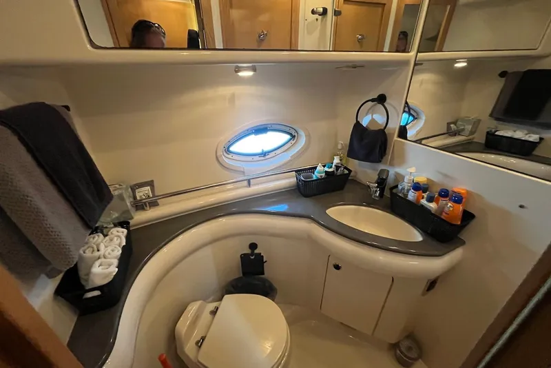 Slide: The Image of Luxurious 2004 Maxum 4200 SY yacht bathroom with modern amenities and elegant design. - 11