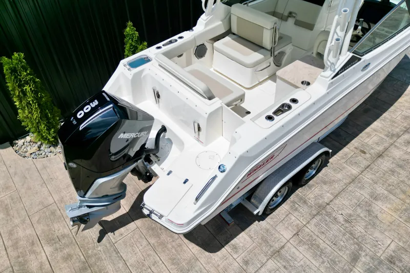 Slide: The Image of 2025 Boston Whaler 240 Vantage boat with Mercury 400 engine on trailer. - 13