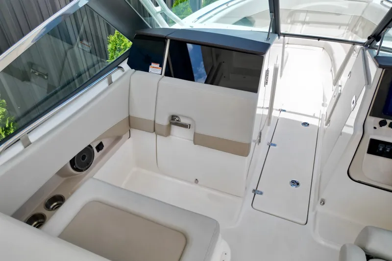 Slide: The Image of 2025 Boston Whaler 240 Vantage interior, featuring sleek seating and modern design elements. - 8