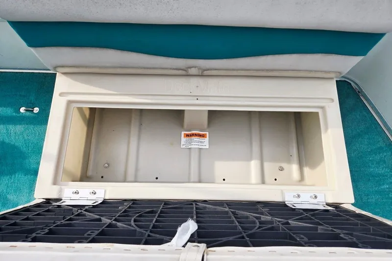 Slide: The Image of Storage compartment on a 1998 Sun Tracker Fishin' Barge 21 Signature Series boat. - 35