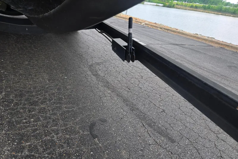 Slide: The Image of Trailer hitch of a 2016 Ranger Z521 Comanche on a paved road near water. - 8