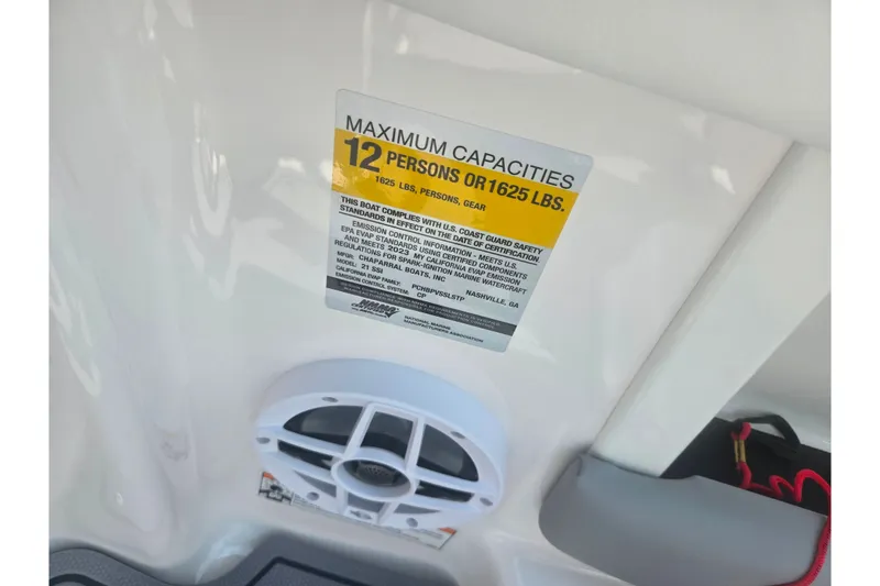 Slide: The Image of 2023 Chaparral 21 SSi boat capacity label, maximum 12 persons or 1625 lbs. - 13