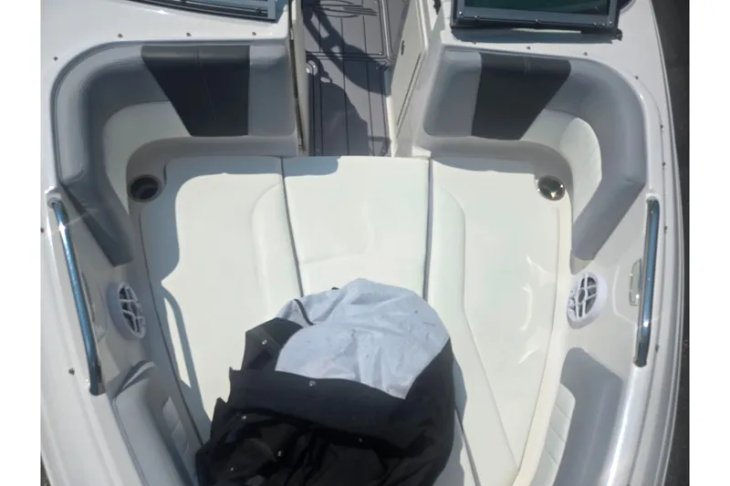 Slide: The Image of 2023 Chaparral 21 SSi boat interior with spacious seating and modern design. - 21