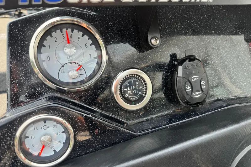 Slide: The Image of Dashboard of a 2022 Nitro Z20 boat featuring gauges and controls. - 12