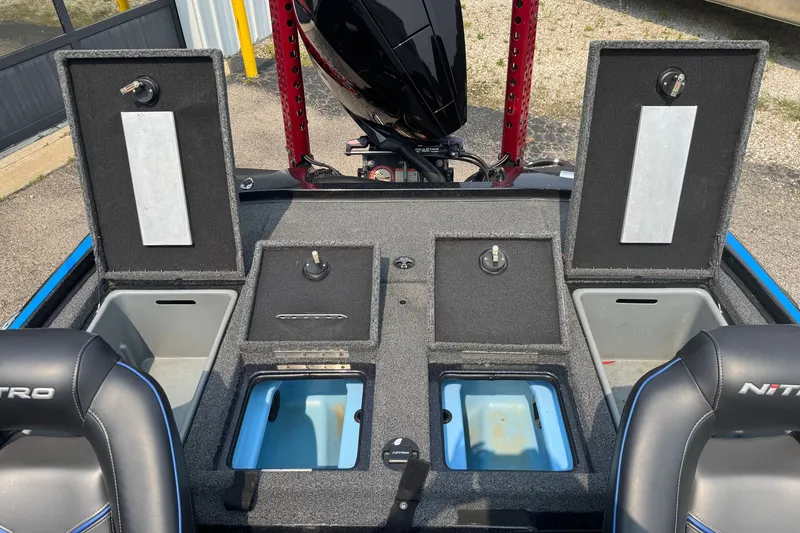 Slide: The Image of 2022 Nitro Z20 boat interior with storage compartments and seating. - 11
