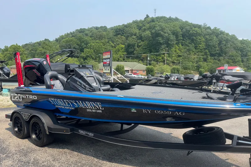 Slide: The Image of 2022 Nitro Z20 boat at Stokley's Marine, Lexington, Kentucky, with scenic background. - 2