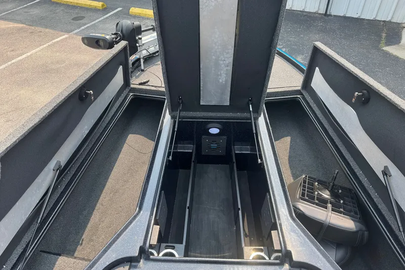 Slide: The Image of 2022 Nitro Z20 boat storage compartments open, showcasing spacious interior design. - 8