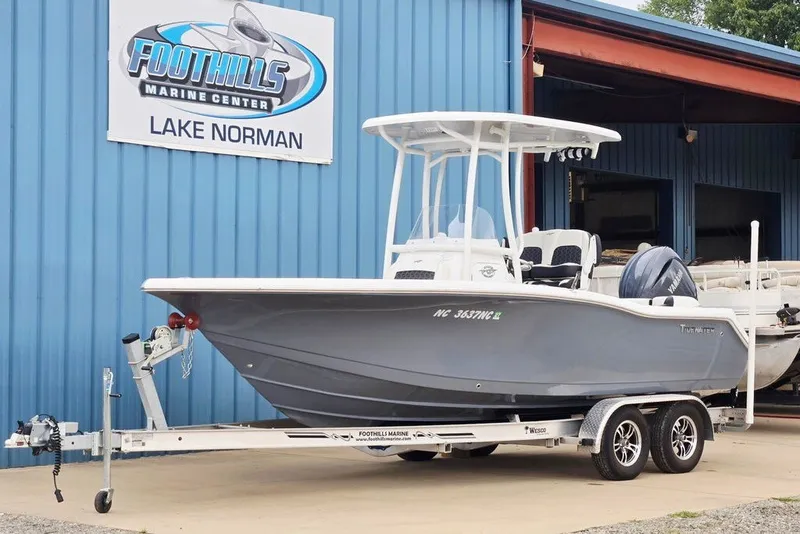 Slide: The Image of 2024 Tidewater 210 LXF boat on trailer at Foothills Marine Center, Lake Norman. - 1