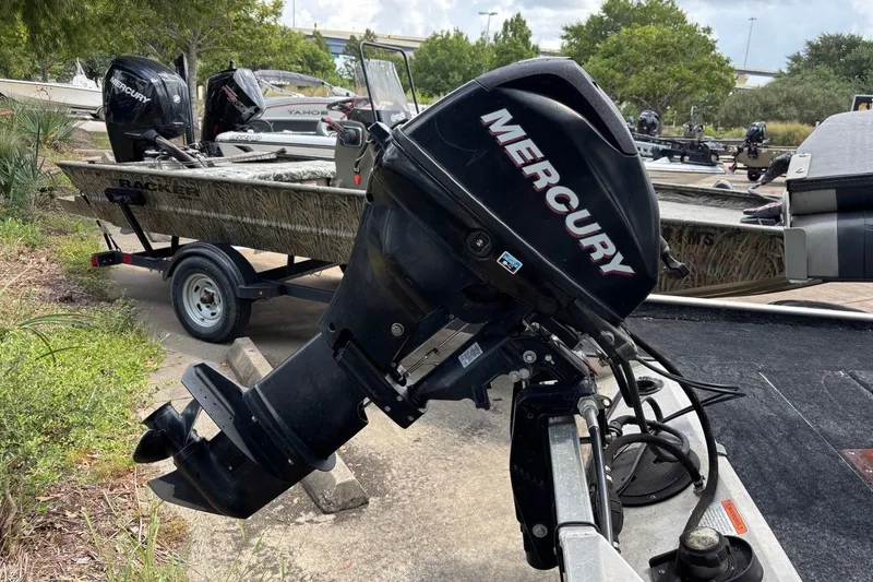 Slide: The Image of 2012 Tracker Pro 165 boat with Mercury outboard motor on trailer. - 14