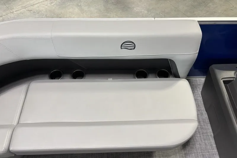Slide: The Image of 2027 Sun Tracker Party Barge 16 DLX seating with integrated cup holders and sleek design. - 19