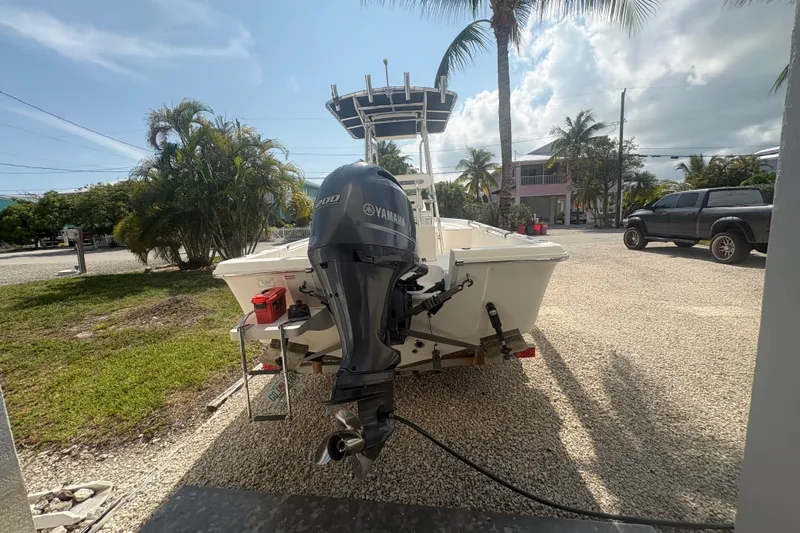Slide: The Image of 2015 Bulls Bay 2200 boat with Yamaha engine parked on gravel driveway. - 5