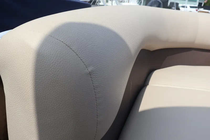 Slide: The Image of Beige leather seating on 2015 Palm Beach Ultra Sport 220 RL boat. - 17