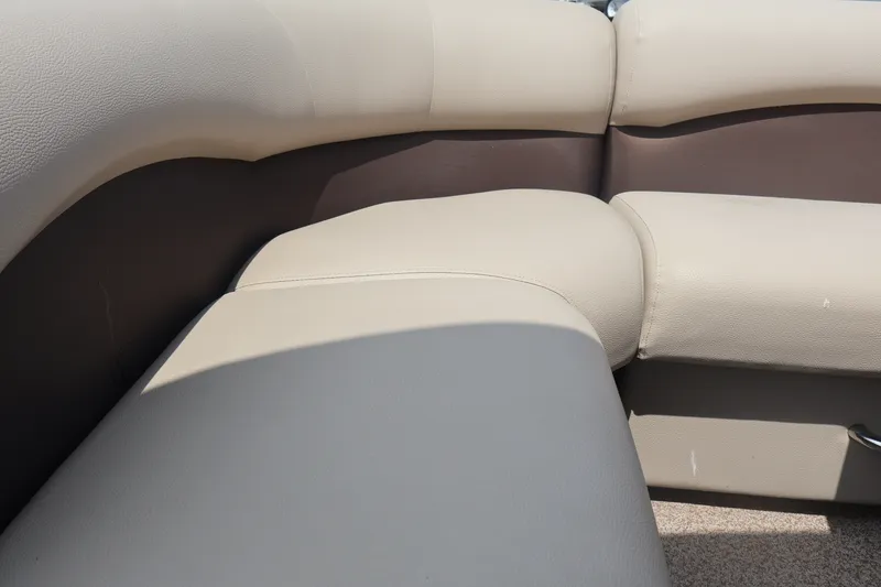 Slide: The Image of Beige and brown seating on 2015 Palm Beach Ultra Sport 220 RL boat. - 22