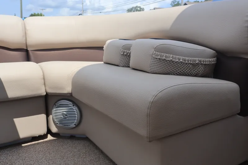 Slide: The Image of Luxurious seating on 2015 Palm Beach Ultra Sport 220 RL boat with speaker detail. - 21